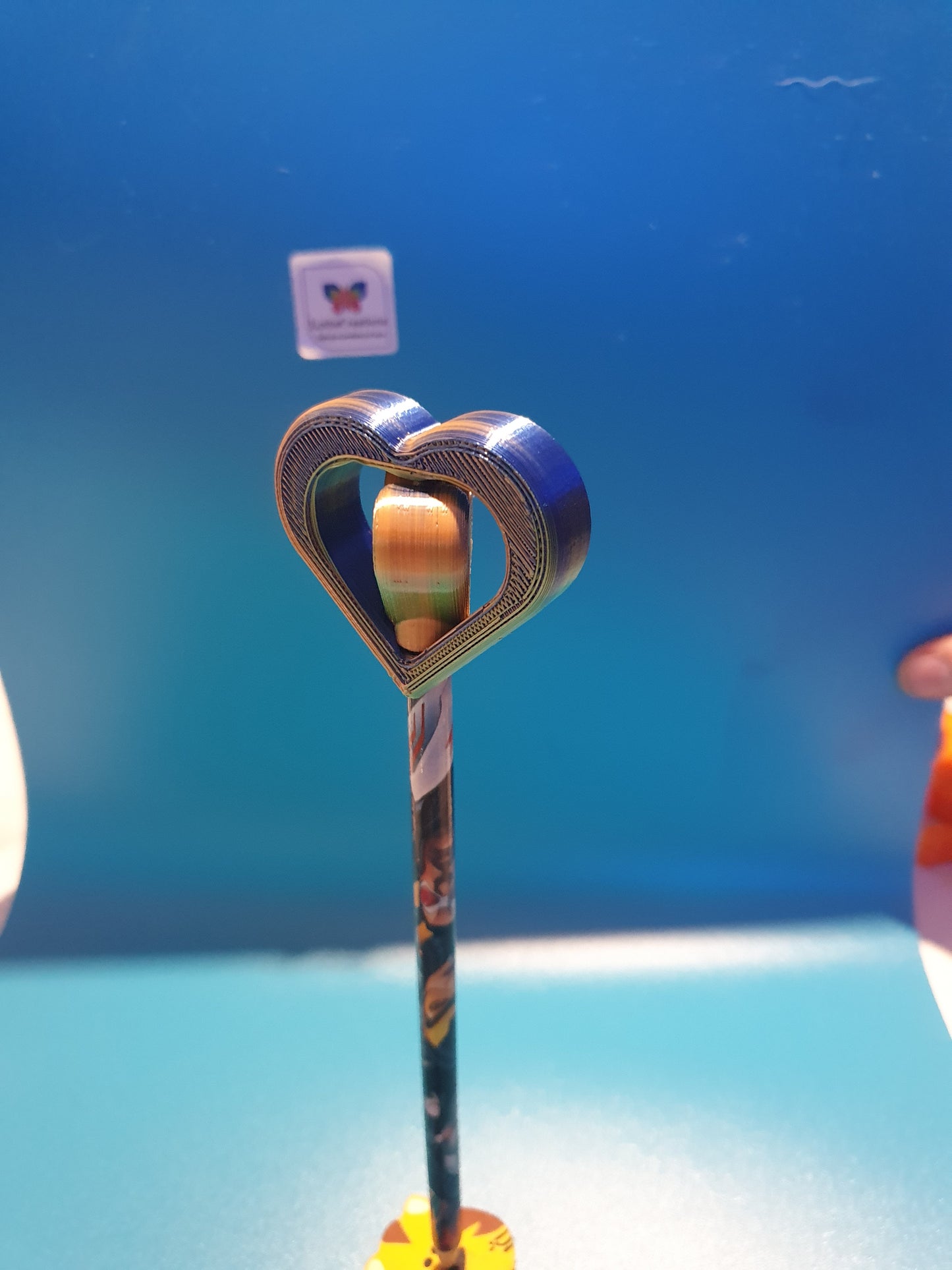 Heart spinner pencil topper